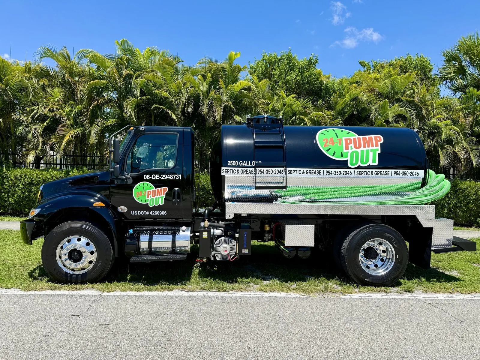 Side of the 24-7 Pump Out heavy-duty septic and grease vacuum truck